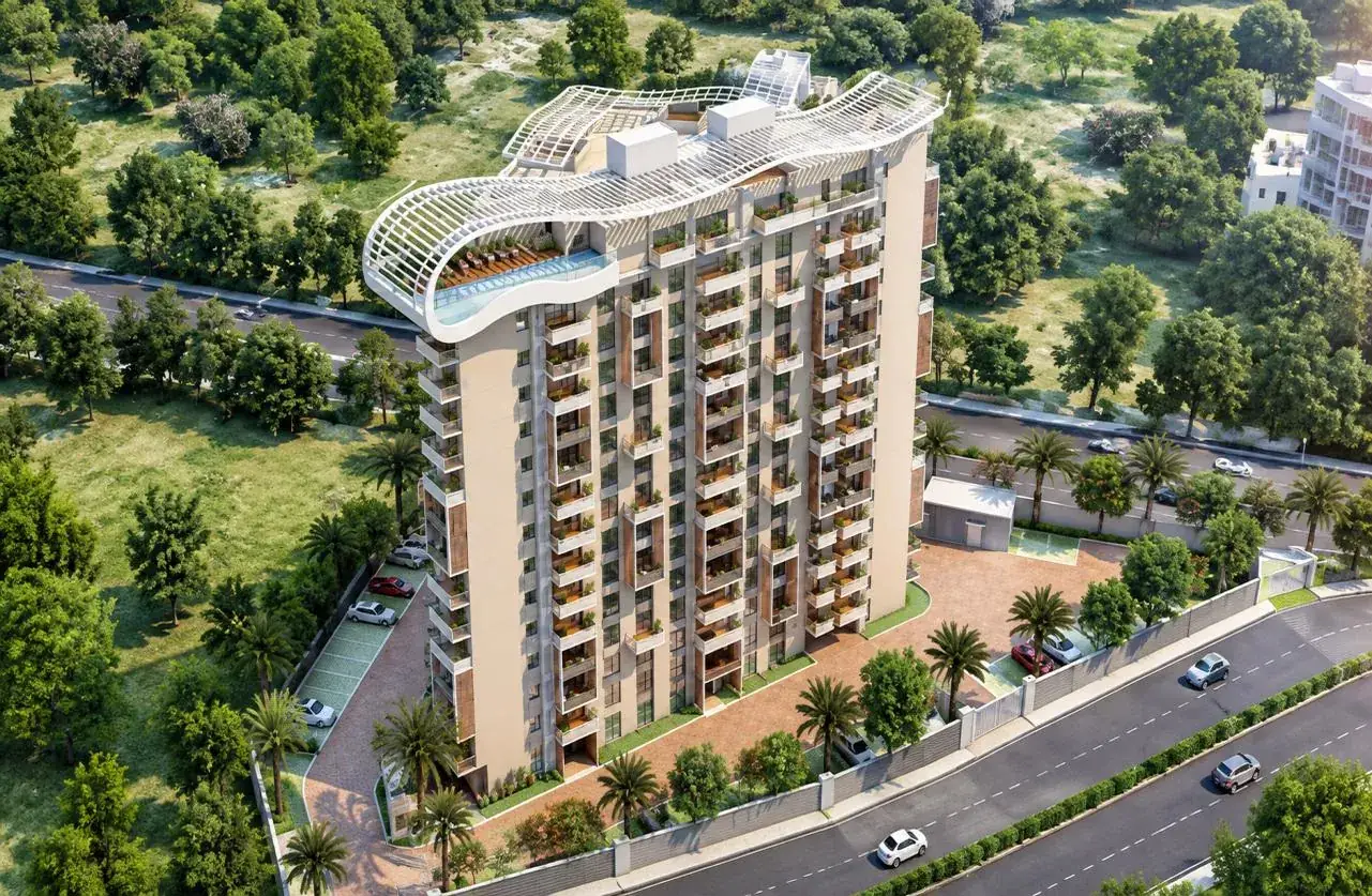 Aerial view of the triangular Premia tower with rooftop sky terrace, Jakkur
