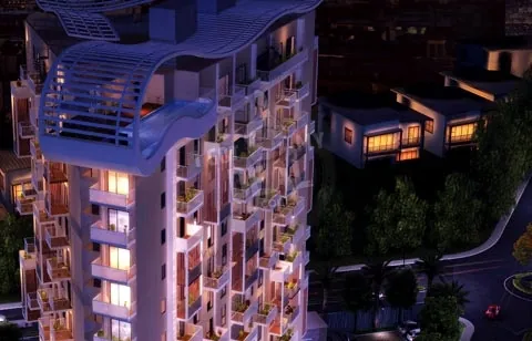 Premia rooftop canopy and upper floors lit at night
