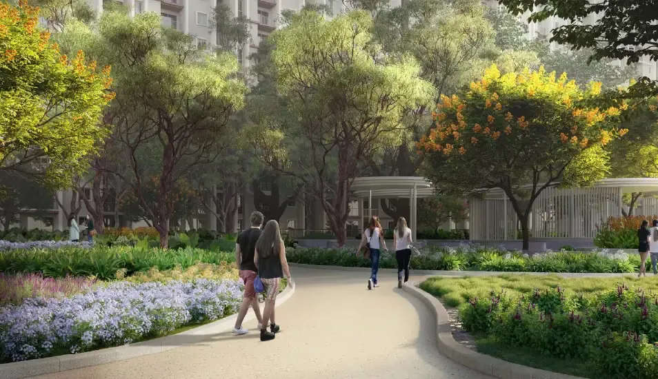Flowering garden walkway with pavilions at Purvankara Northern Lights
