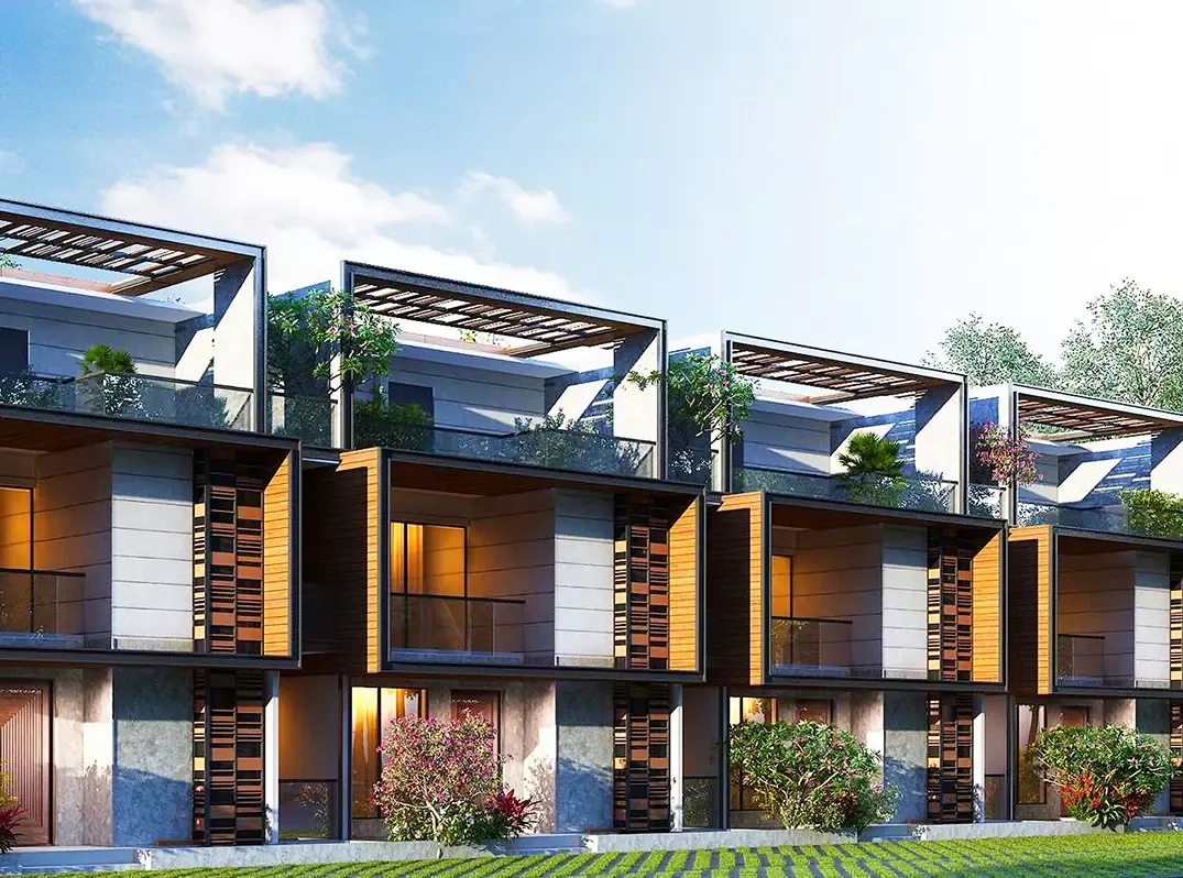Row of Sattva La Vita triplex villas with rooftop pergolas