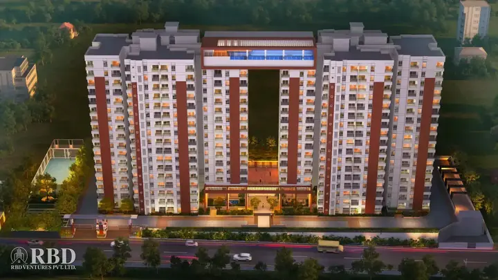 Night aerial view of Vajram Newtown II with the lit entrance and podium garden (artist's impression)